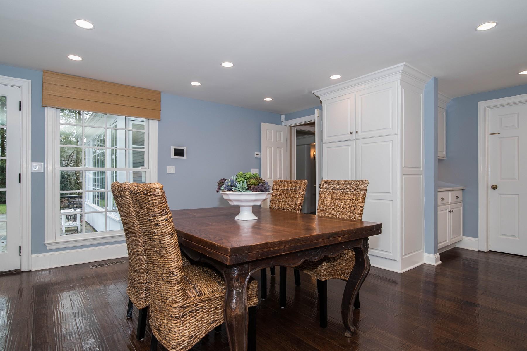 142 Brookside Road Darien, CT 06820 - Photo 10 of 25 a view of a dining room with furniture window and wooden floor