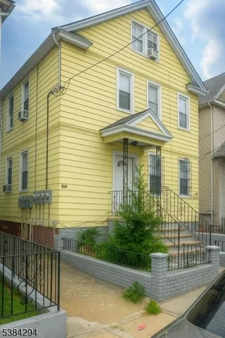 a front view of a house having yard