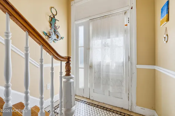 a bathroom with a glass shower door