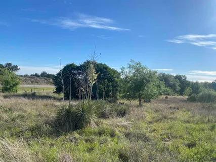 a view of a lake with a outdoor space