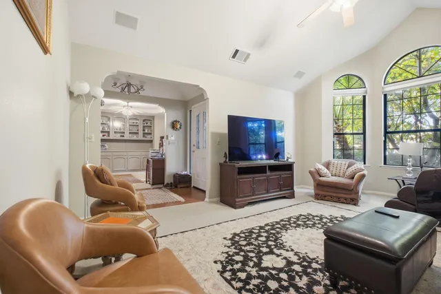 a view of a hallway view with staircase