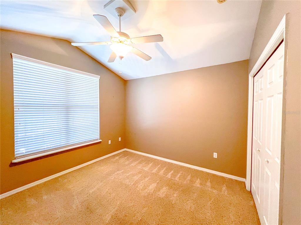 14479 Northwest 25th Road Newberry, FL 32669 - Photo 11 of 15 a view of an empty room with a window