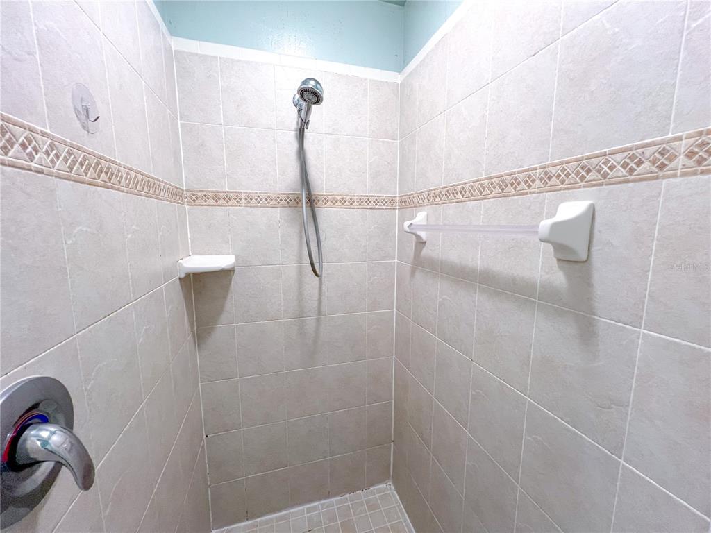 14479 Northwest 25th Road Newberry, FL 32669 - Photo 14 of 15 a bathroom with a shower