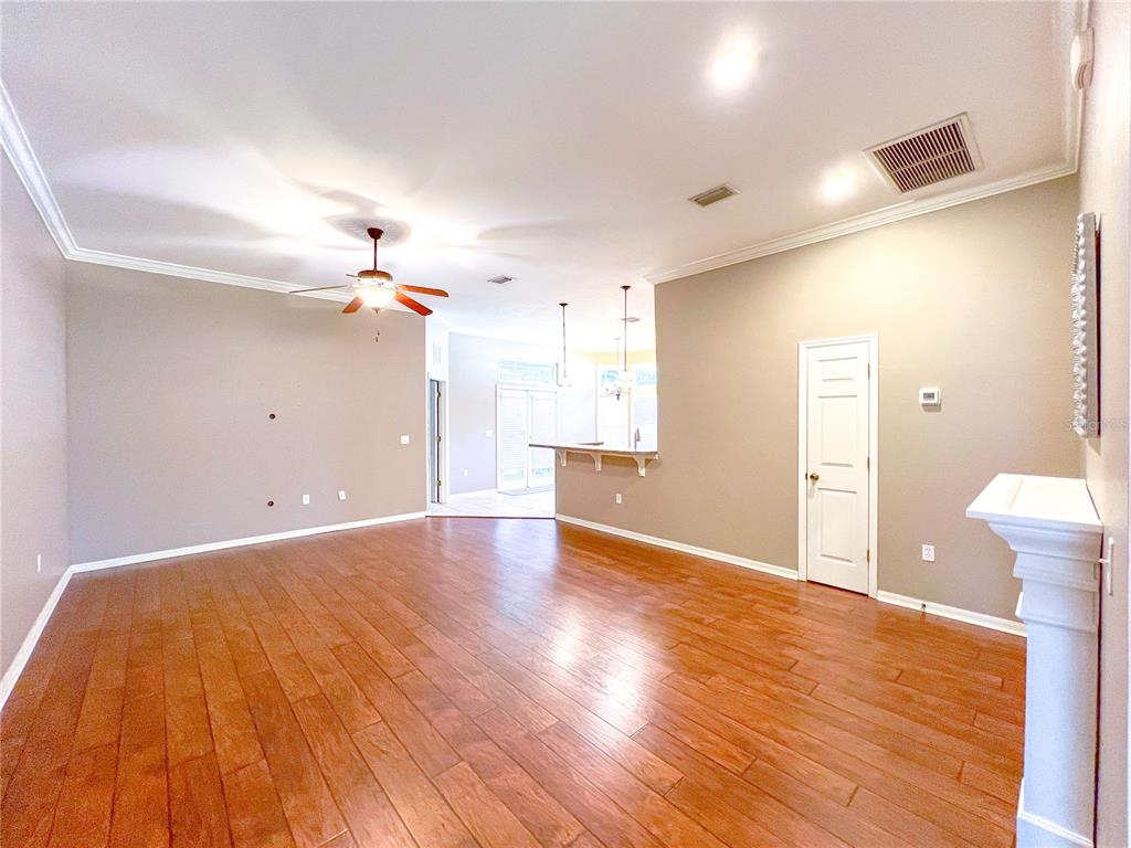 14479 Northwest 25th Road Newberry, FL 32669 - Photo 3 of 15 a view of a livingroom with wooden floor