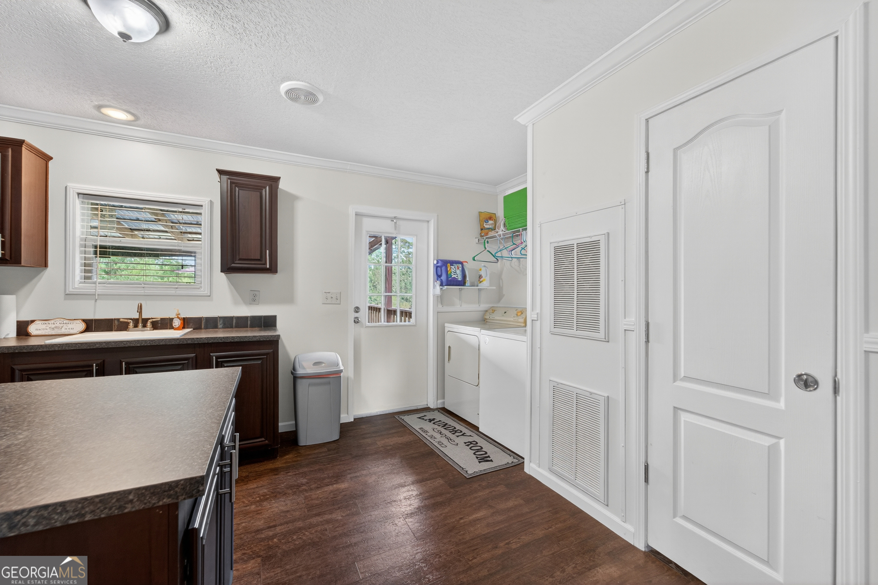 1953 Raybon Road West Hoboken, GA 31542 - Photo 22 of 31 a kitchen with a refrigerator stove and sink
