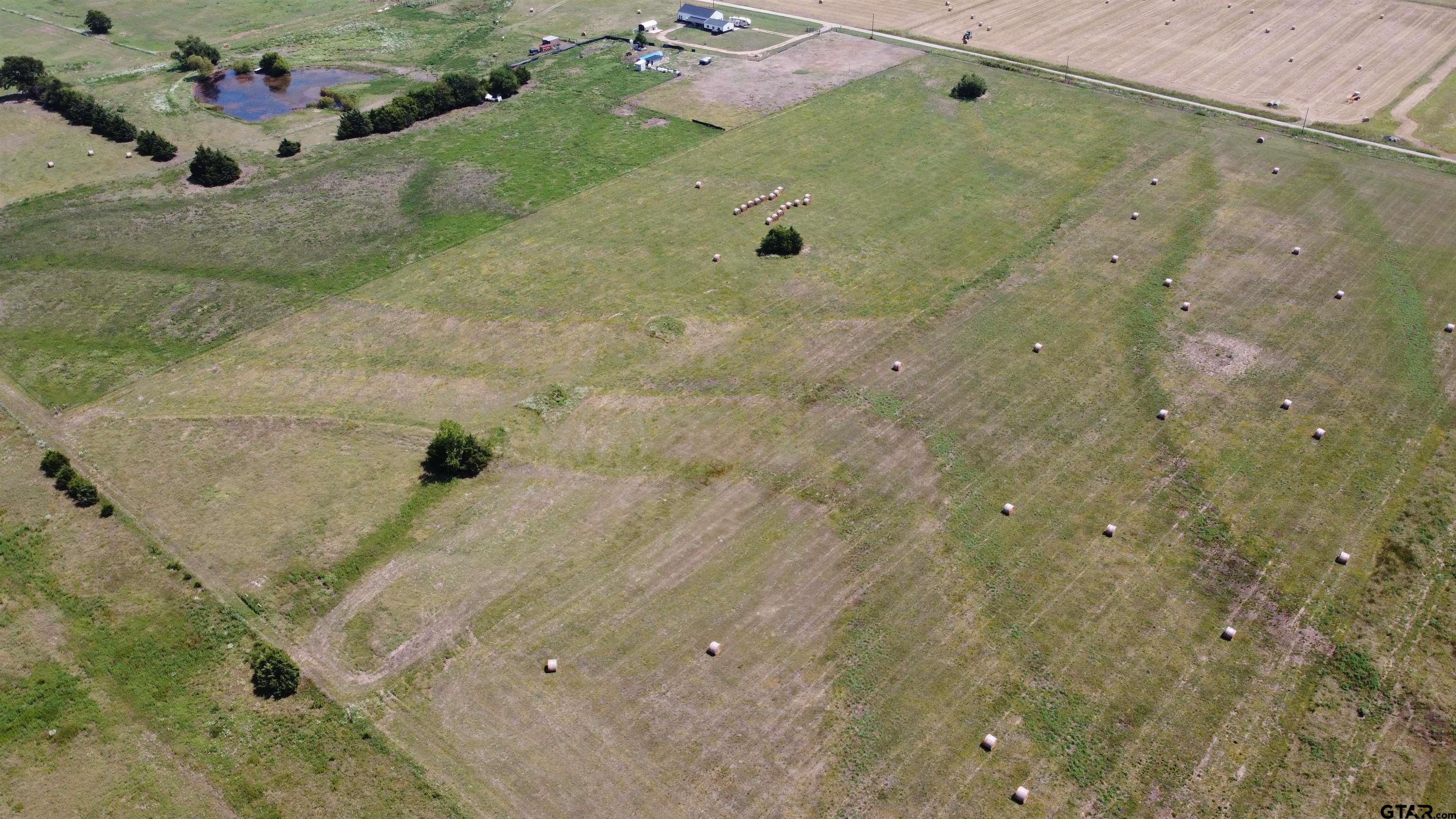 2105 County Road 2105 Cooper, TX 75432 - Photo 4 of 6 a bathroom with a sink and mirror