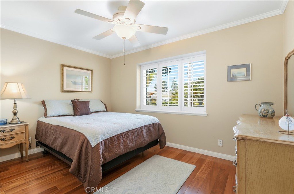 516 South Peregrine Street Anaheim, CA 92806 - Photo 22 of 34 a bedroom with a bed and a window
