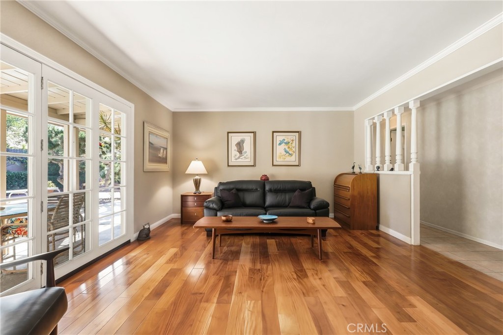 516 South Peregrine Street Anaheim, CA 92806 - Photo 7 of 34 a living room with furniture and a wooden floor