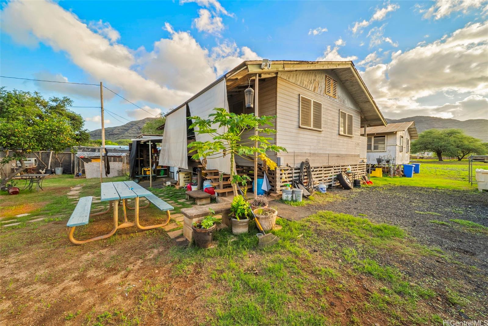 87-879 Apuupuu Road Waianae, HI 96792 - Photo 17 of 21 a front view of a house with garden