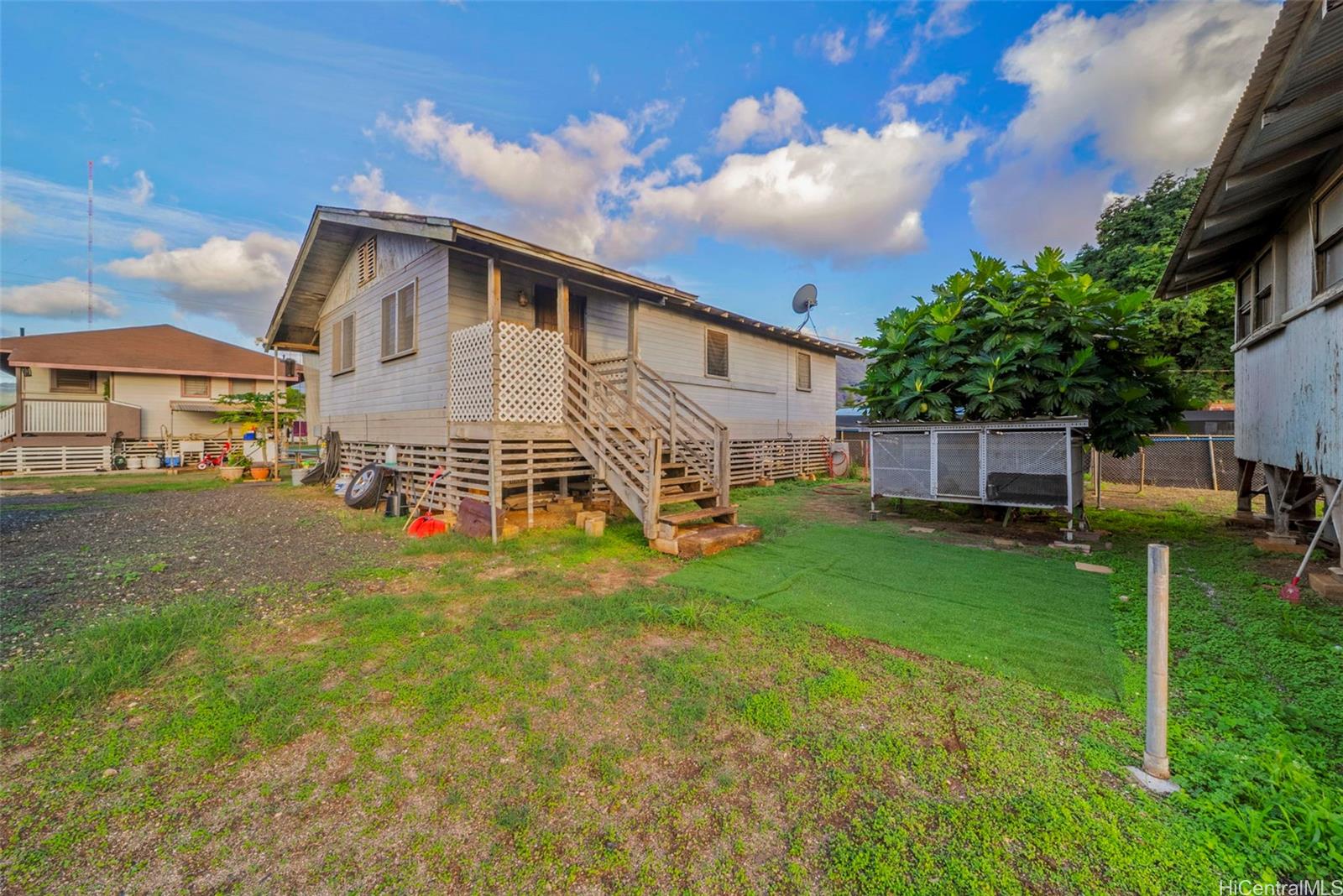 87-879 Apuupuu Road Waianae, HI 96792 - Photo 18 of 21 a view of a house with a yard