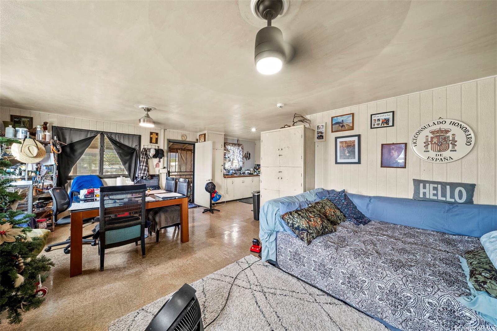 87-879 Apuupuu Road Waianae, HI 96792 - Photo 21 of 21 a bedroom with furniture and a wooden floor