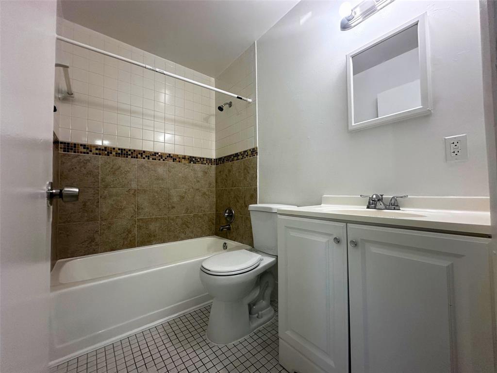 928 South Federal Highway, Unit 20 Lake Worth Beach, FL 33460 - Photo 8 of 12 a bathroom with a sink toilet and shower