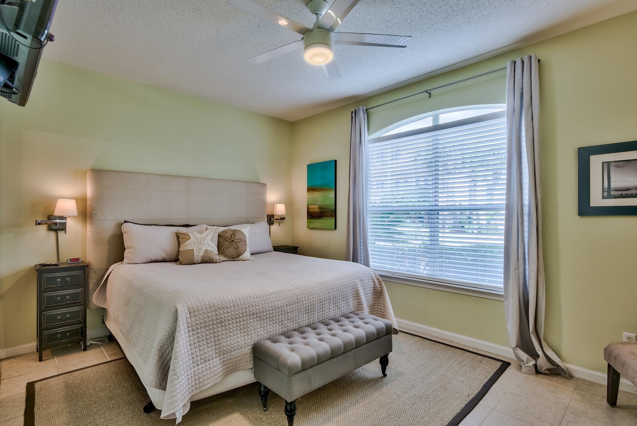 16 Ruby Cove Miramar Beach, FL 32550 - Photo 18 of 40 a bedroom with a bed and a chandelier