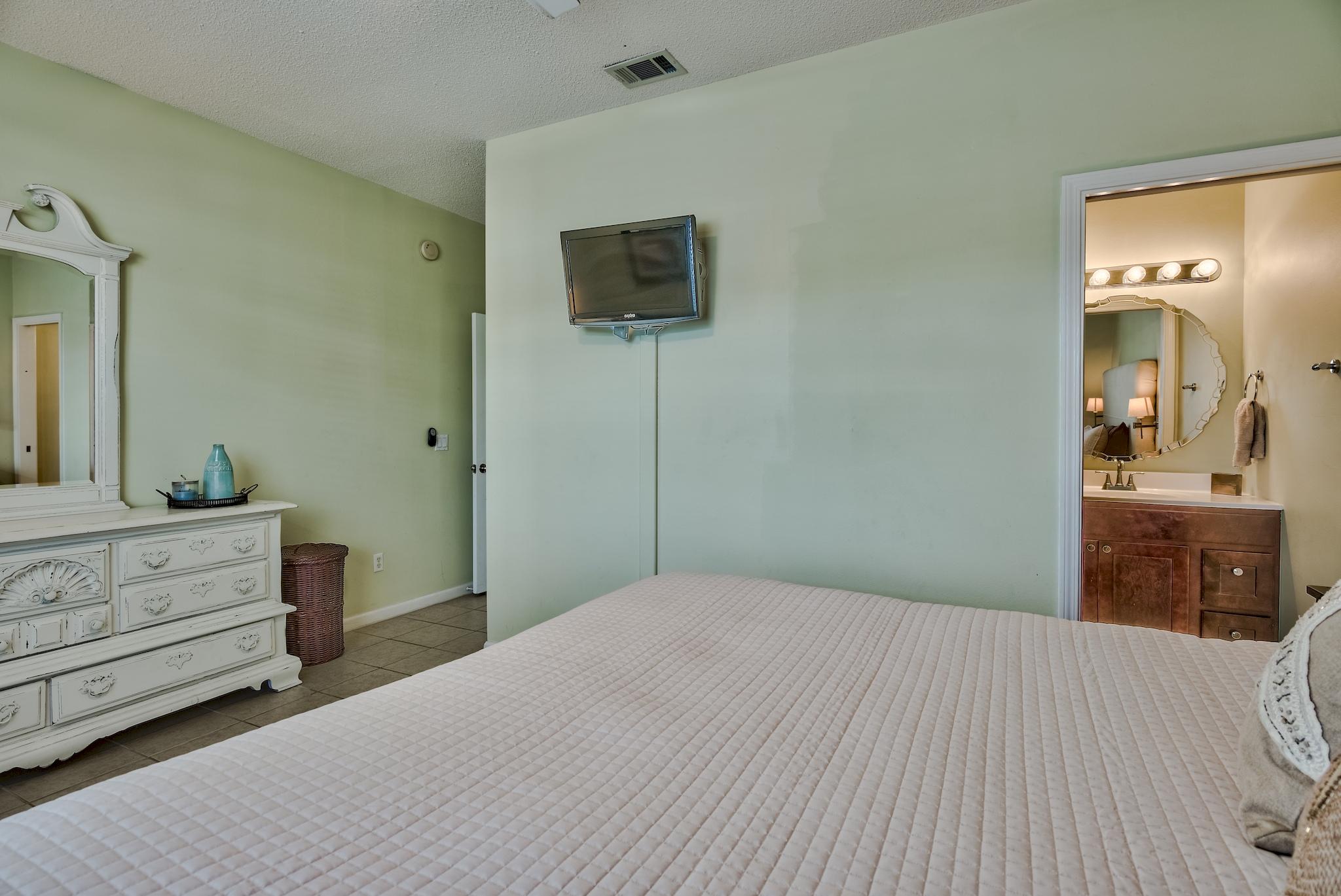 16 Ruby Cove Miramar Beach, FL 32550 - Photo 19 of 40 a bedroom with a bed and a dresser