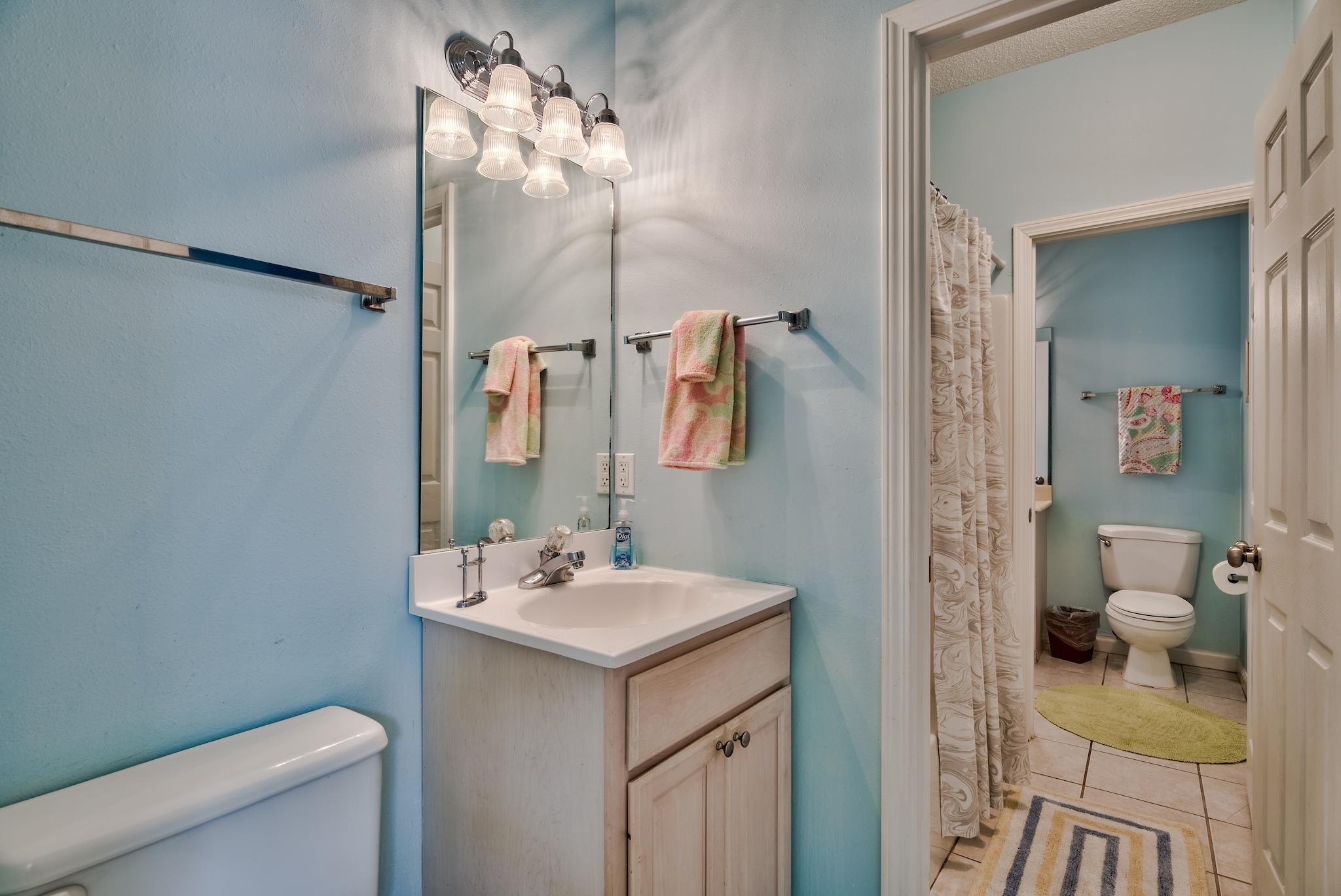 16 Ruby Cove Miramar Beach, FL 32550 - Photo 23 of 40 a bathroom with a sink toilet and a mirror