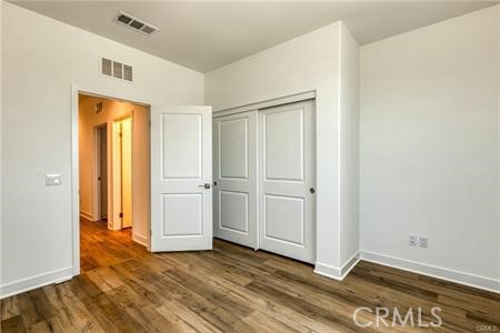 434 Harding Road Corona, CA 92879 - Photo 18 of 44 a view of an empty room with closet and a window
