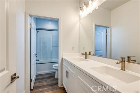 434 Harding Road Corona, CA 92879 - Photo 19 of 44 a bathroom with a double vanity sink mirror and toilet