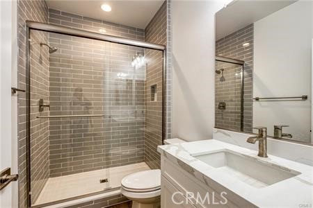 434 Harding Road Corona, CA 92879 - Photo 36 of 44 a bathroom with a sink a toilet and shower