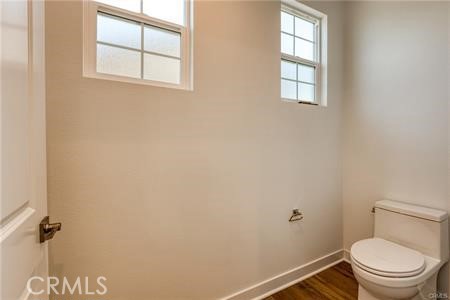 434 Harding Road Corona, CA 92879 - Photo 6 of 44 a white toilet sitting next to a window