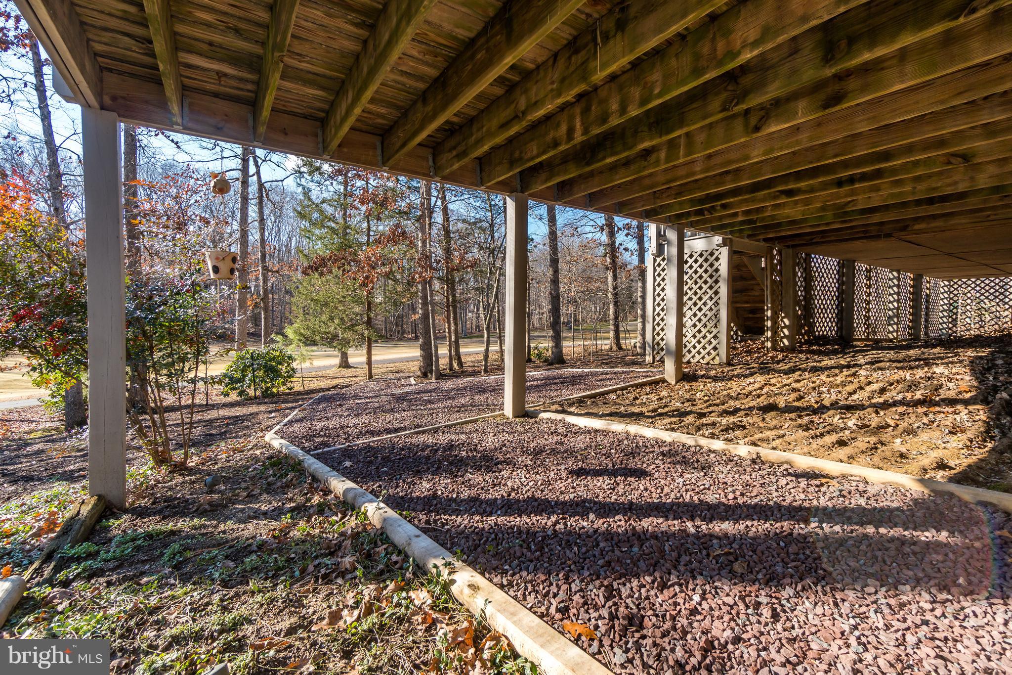 234 Birdie Road Locust Grove, VA 22508 - Photo 51 of 56 Put your golf cart under the deck