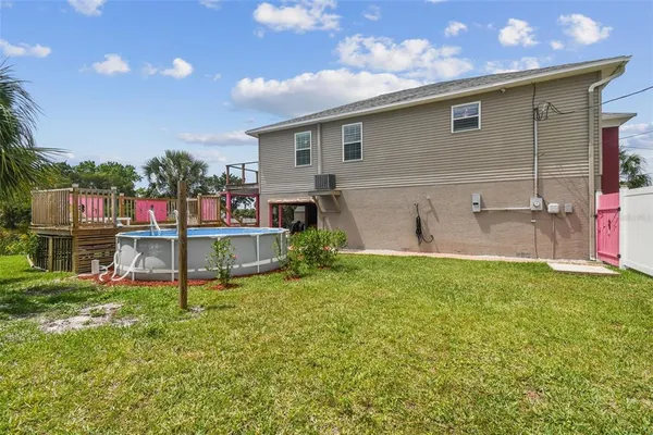 a view of outdoor space with deck and living space