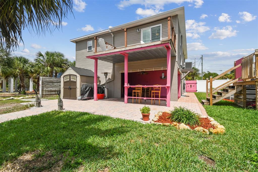3227 Rose Arbor Drive Hernando Beach, FL 34607 - Photo 33 of 52 front view of a house with a yard