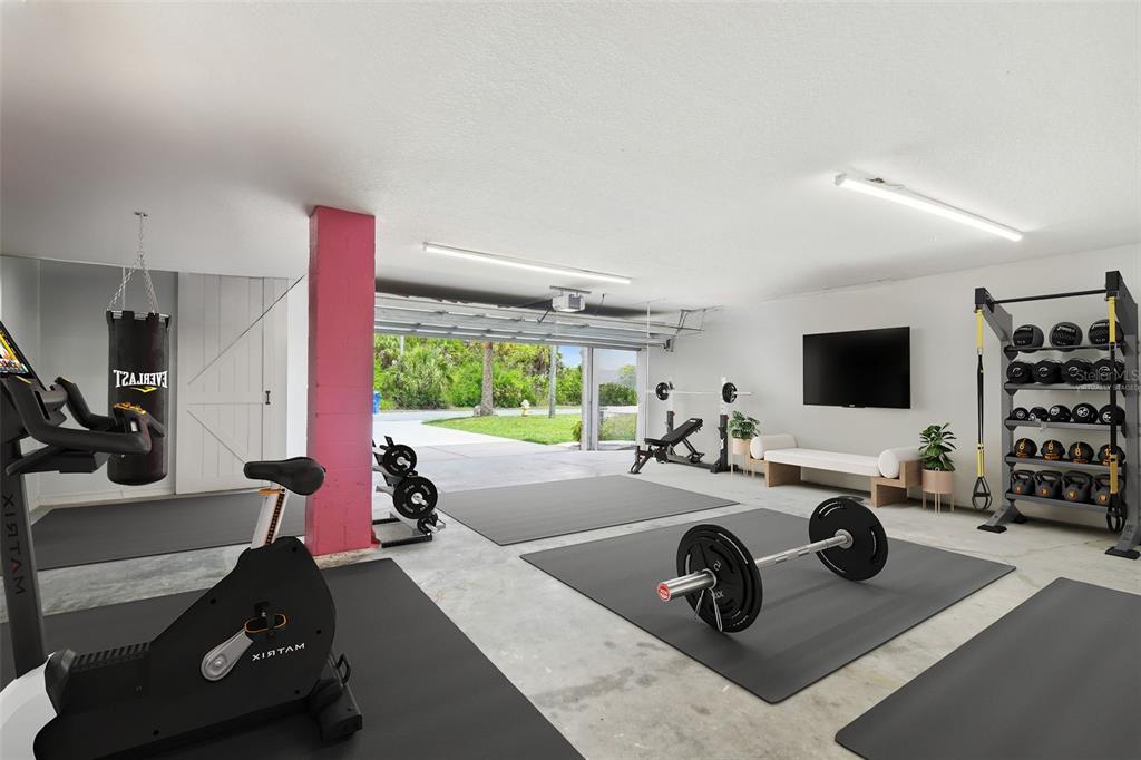 3227 Rose Arbor Drive Hernando Beach, FL 34607 - Photo 41 of 52 a view of a room with gym equipment