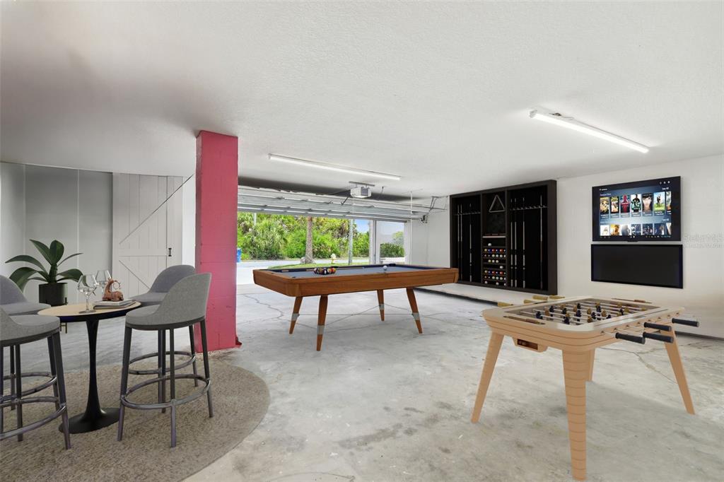 3227 Rose Arbor Drive Hernando Beach, FL 34607 - Photo 42 of 52 a room with furniture and a rug