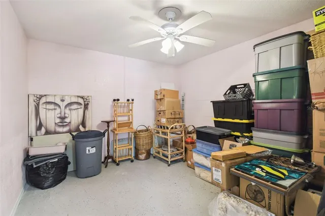 a view of a lake with houses in the back