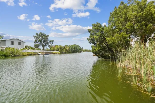 a view of a swimming pool and lake view