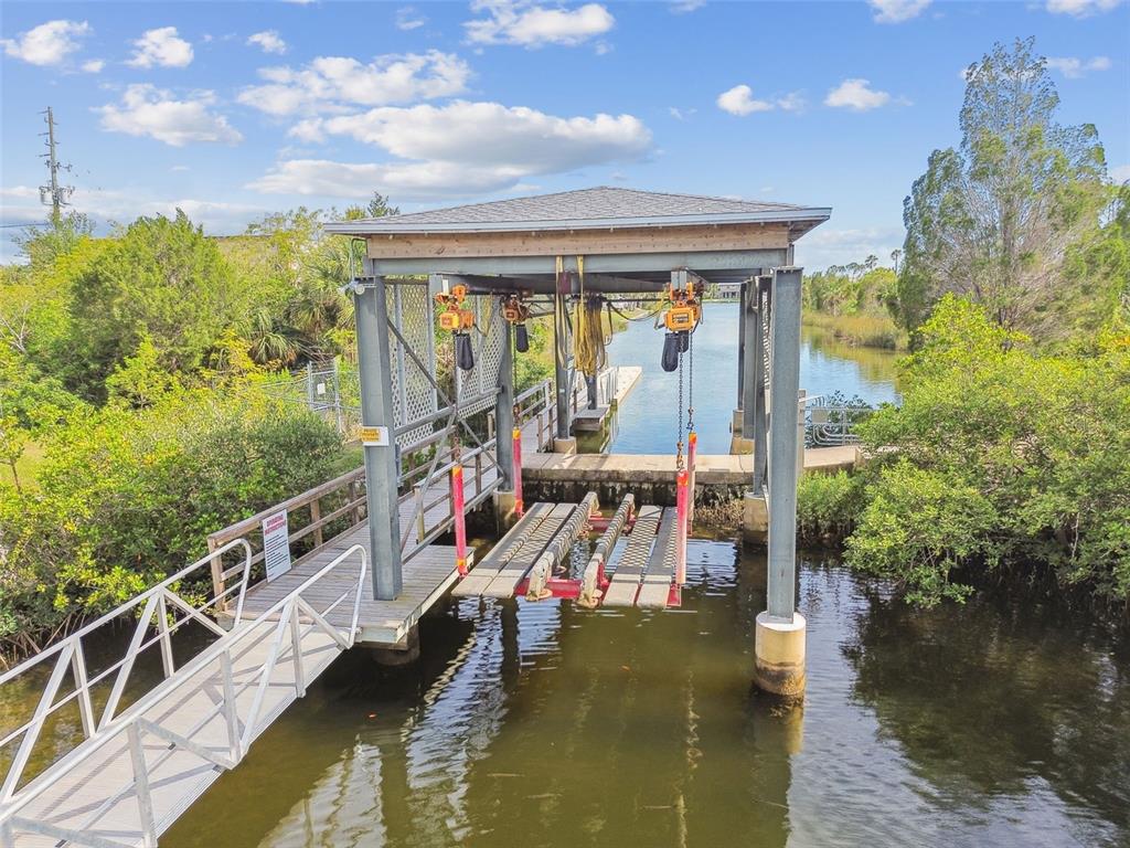 3227 Rose Arbor Drive Hernando Beach, FL 34607 - Photo 49 of 52 a view of a balcony with chairs
