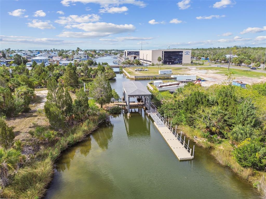 3227 Rose Arbor Drive Hernando Beach, FL 34607 - Photo 51 of 52 a view of a swimming pool and lake view