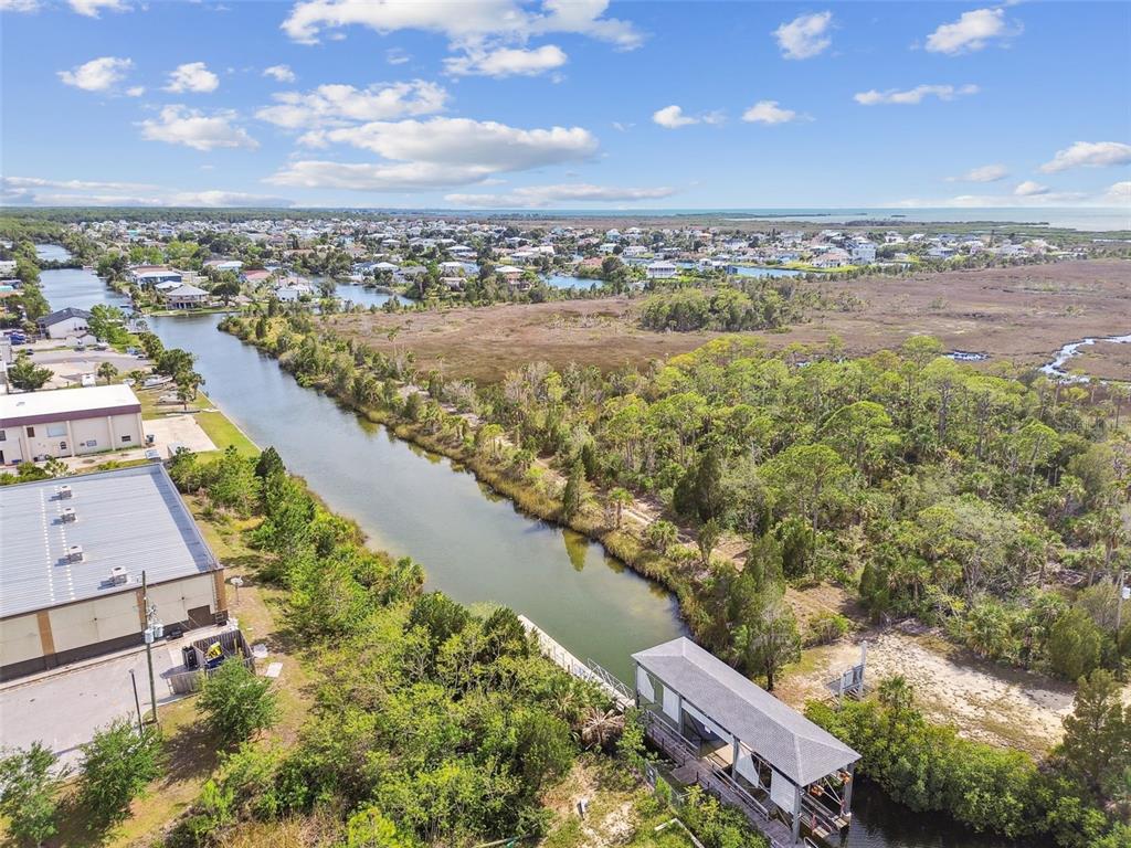 3227 Rose Arbor Drive Hernando Beach, FL 34607 - Photo 52 of 52 a view of a city and an ocean view