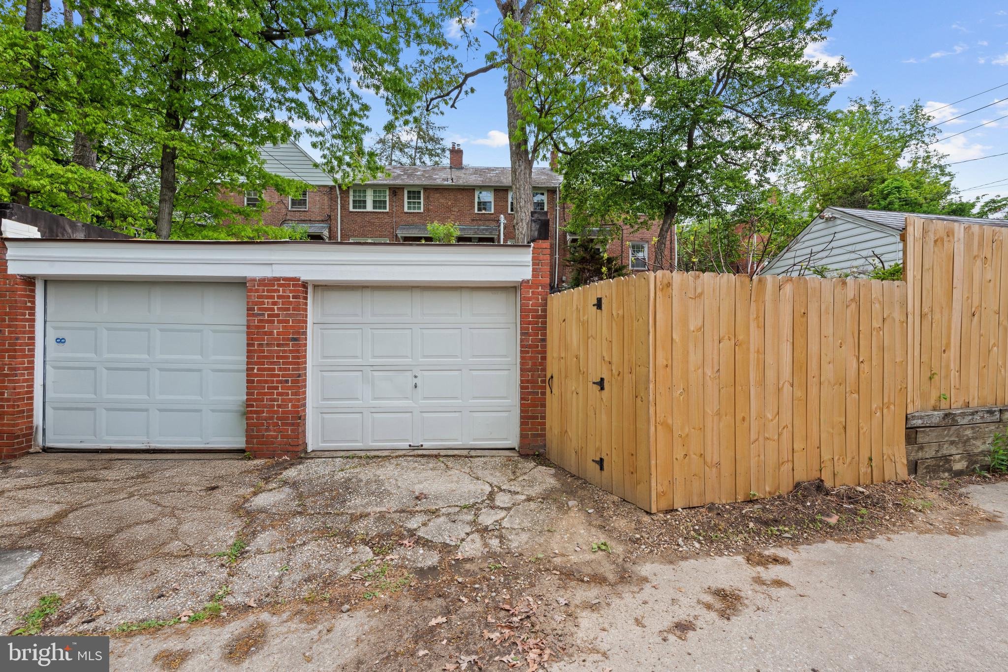 4212 Westview Road Baltimore, MD 21218 - Photo 23 of 35 One car garage to right and newly fenced yard