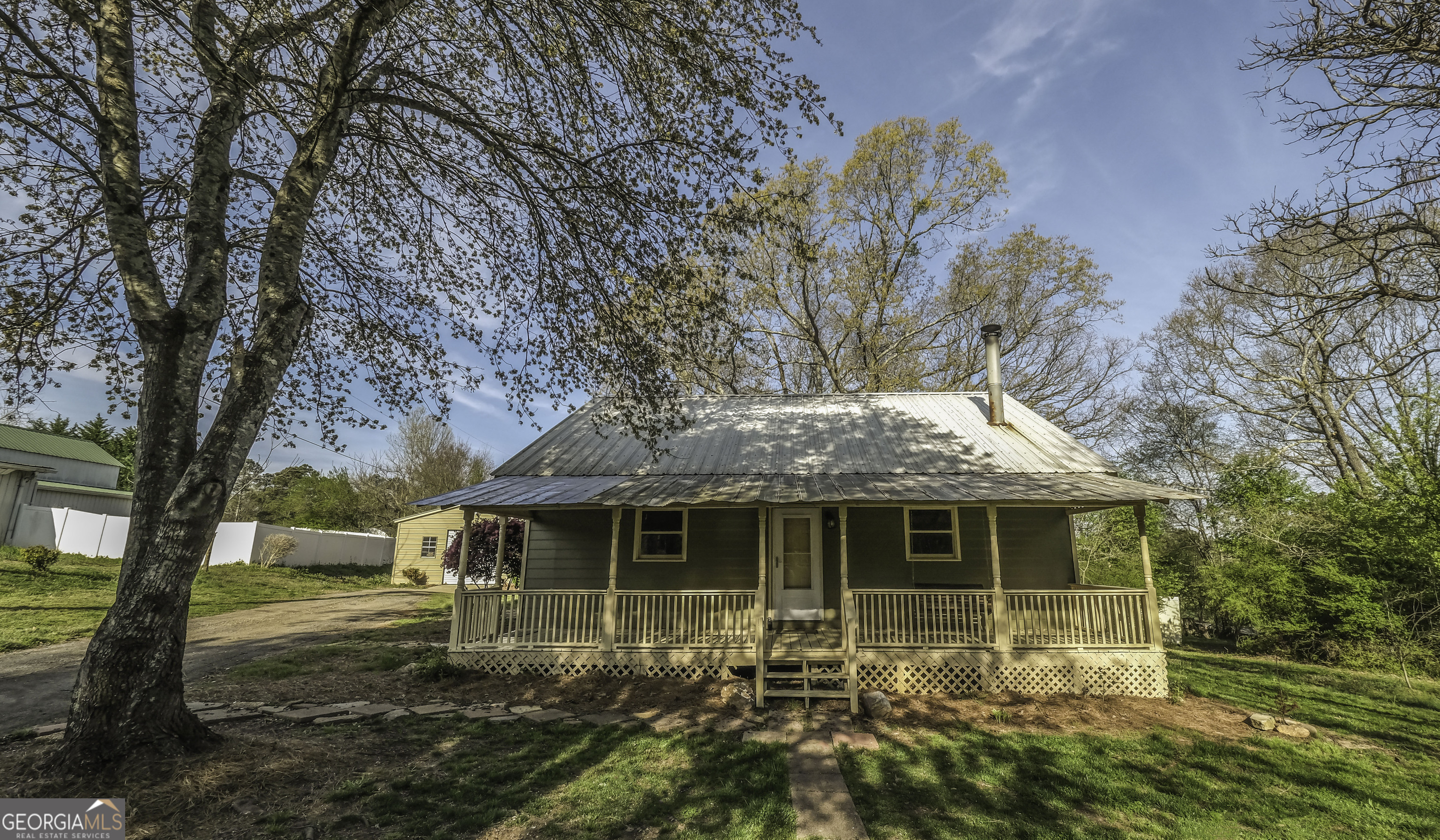 1138 Little Vine Church Road Villa Rica, GA 30180 - Photo 1 of 1 a front view of a house with garden