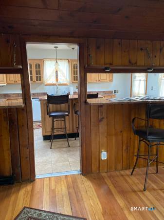 134 Delaware Road Easton, CT 06612 - Photo 3 of 7 a view of kitchen with furniture and window