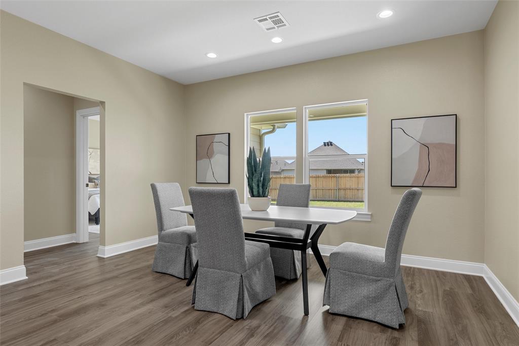 929 Northern Dancer Drive Hewitt, TX 76643 - Photo 9 of 36 a view of a dining room with furniture window and wooden floor