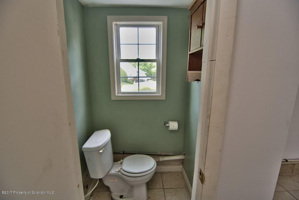 414 Spring Street Moosic, PA 18507 - Photo 54 of 55 a bathroom with a toilet