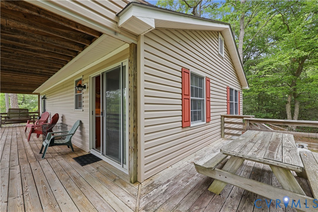 471 Knights Run Road Heathsville, VA 22473 - Photo 36 of 36 Expansive wood deck with a built-in picnic table,