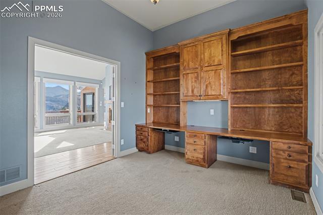 5510 Wilson Road Colorado Springs, CO 80919 - Photo 14 of 44 Office with view into living room.
