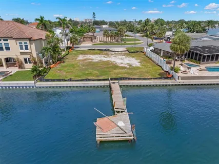 a view of a swimming pool with a lake view