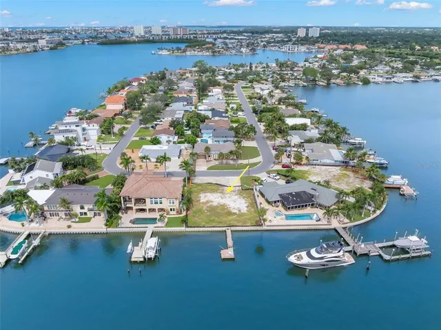 an aerial view of a house with a lake view
