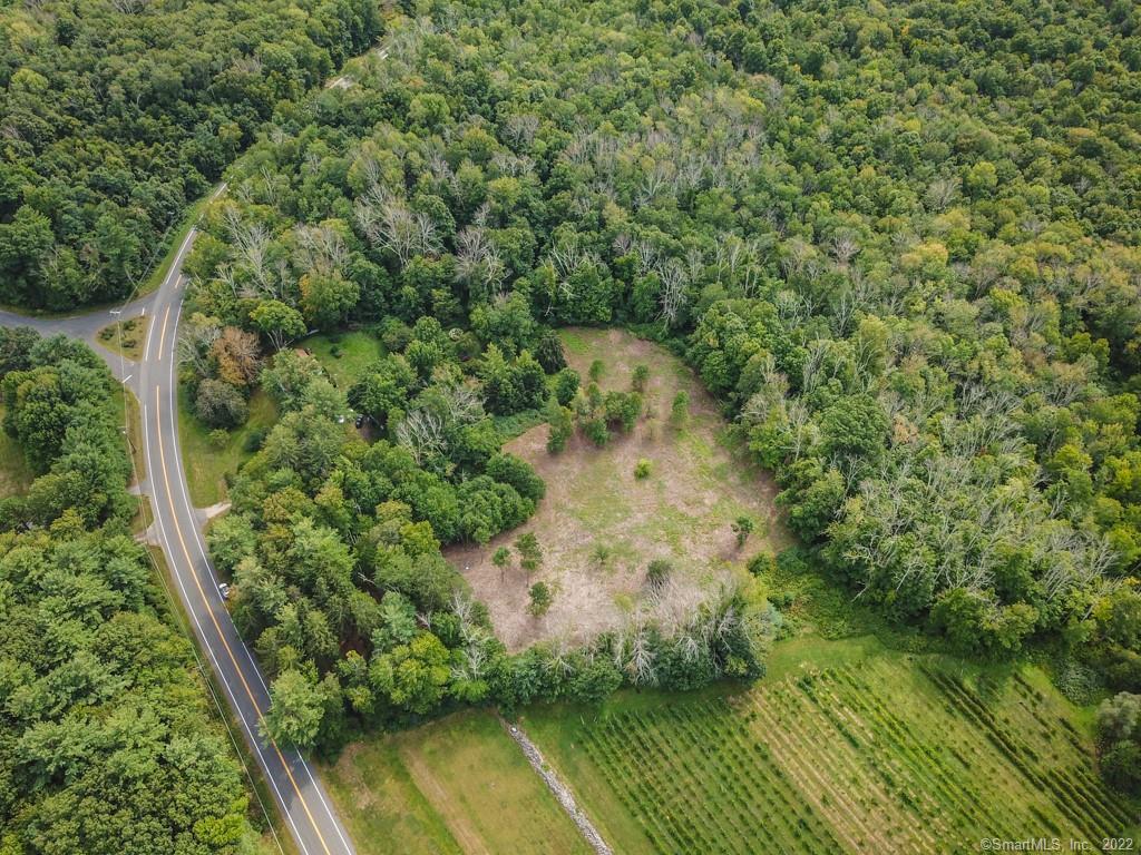 555 Town Hill Road New Hartford, CT 06057 - Photo 2 of 16 a view of a lake with a yard