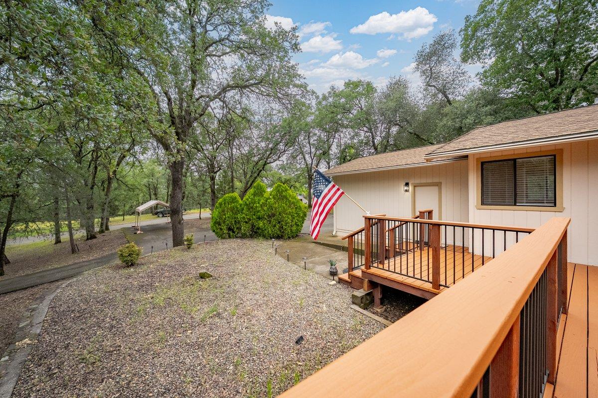 6561 Trinity Way Placerville, CA 95667 - Photo 5 of 58 a view of a roof deck with wooden fence and floor