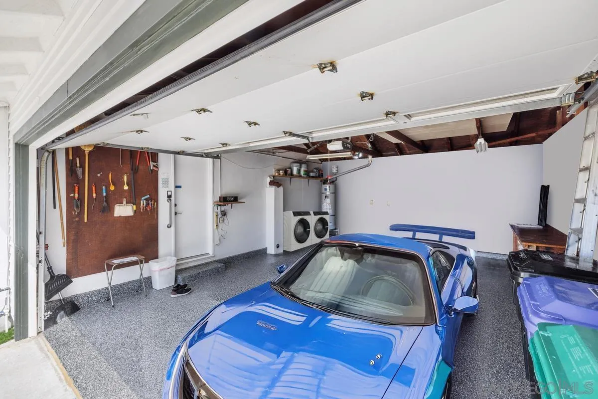 3252 Eichenlaub Street San Diego, CA 92117 - Photo 25 of 36 a car parked in a garage