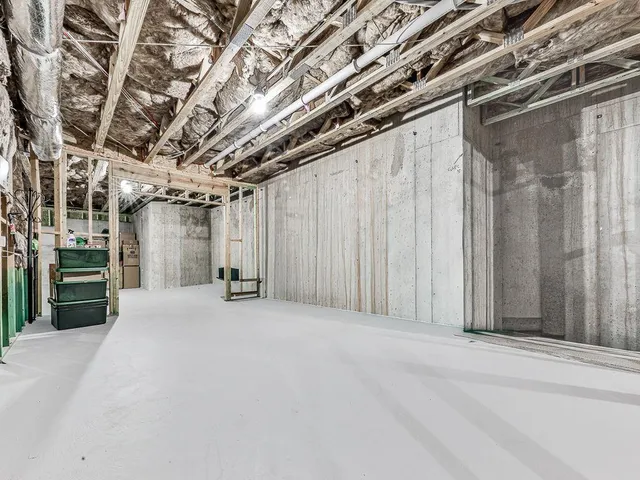 an aerial view of a house with yard swimming pool and outdoor seating
