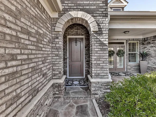 a view of room with painting and wooden floor