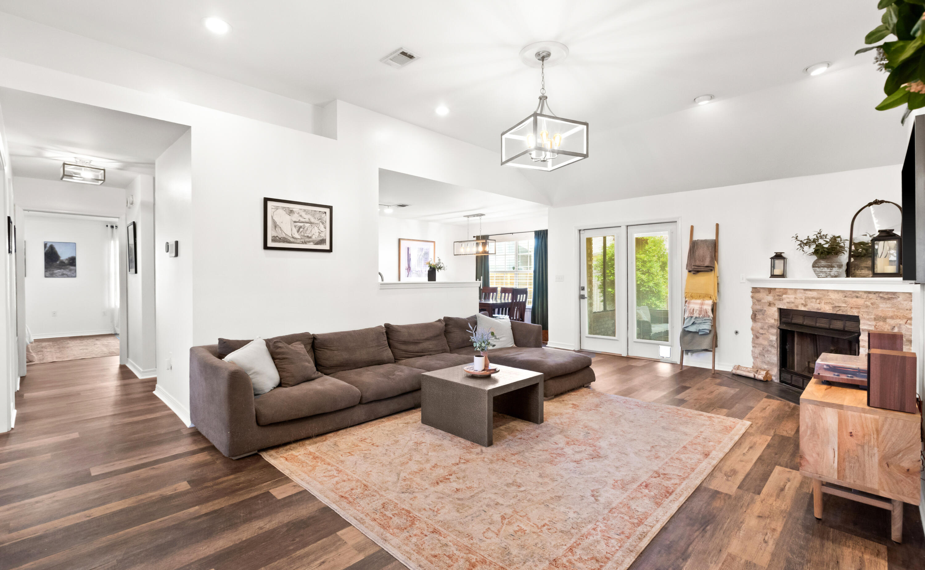 380 Sonora Road Destin, FL 32541 - Photo 13 of 62 a living room with furniture and a fireplace
