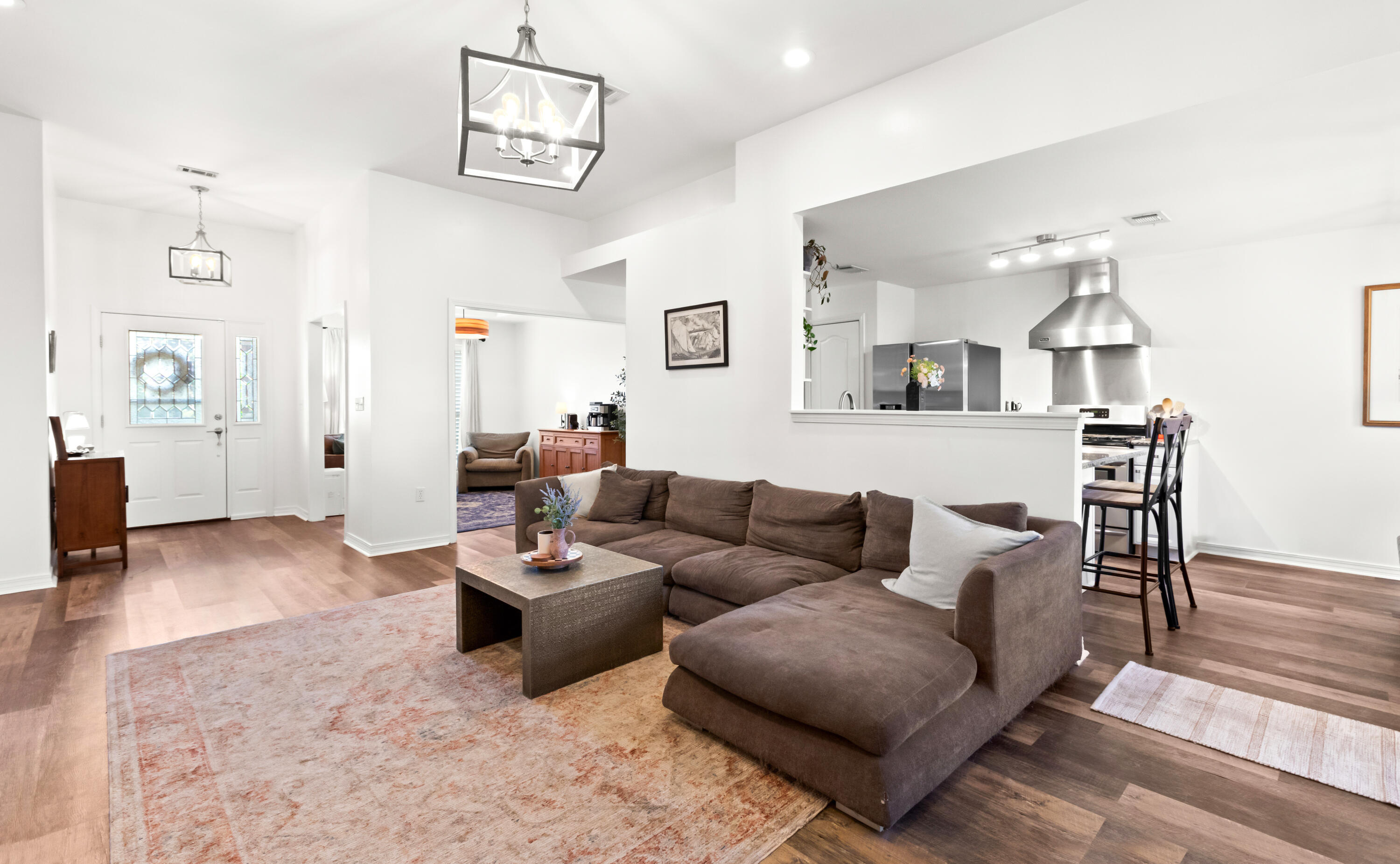 380 Sonora Road Destin, FL 32541 - Photo 14 of 62 a living room with furniture and wooden floor