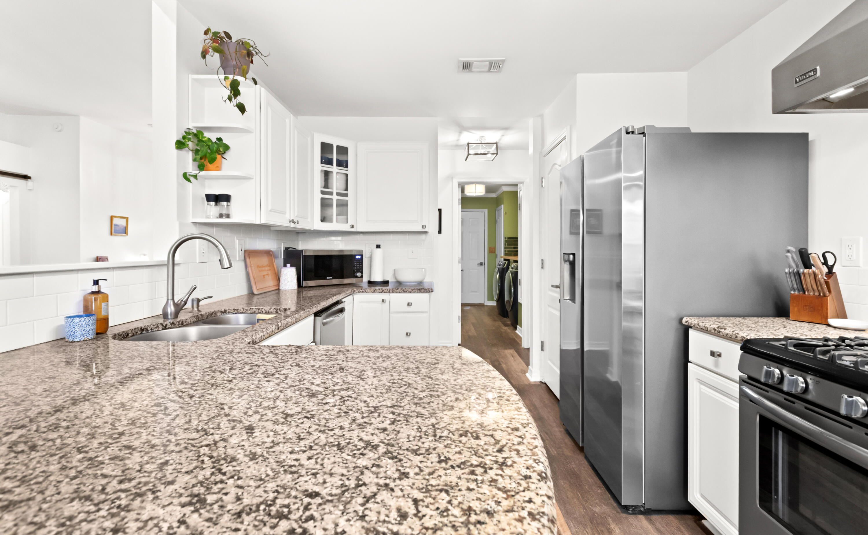 380 Sonora Road Destin, FL 32541 - Photo 21 of 62 a kitchen with stainless steel appliances granite countertop a refrigerator and a stove top oven